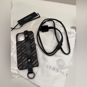 Versace Black Gray Patterned iPhone 12 hard cover with hand strap